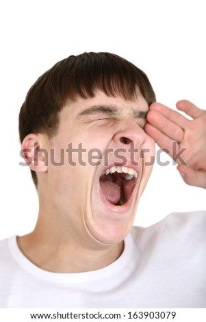 Young Man Yawning Isolated on the White Background