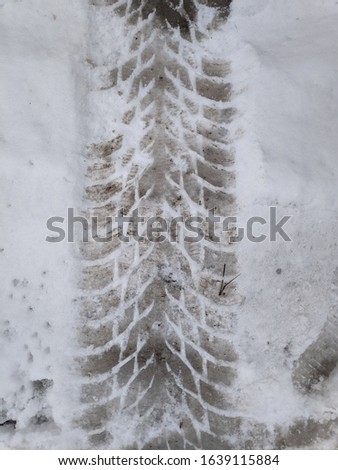 tire tracks in the snow