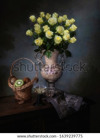 Still life with splendid bouquet of yellow roses