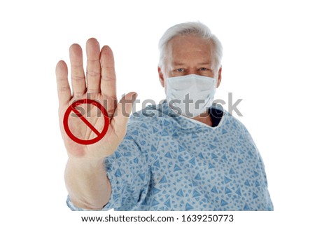 2019 Novel Coronavirus. 2019-nCoV. Wuhan, China 2019 Novel Coronavirus. Medical Patient with International NO Symbol on the palm. Isolated on white. Room for text. Clipping Path. Warning Sign.