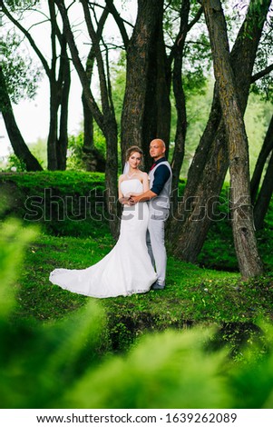 the couple on the nature.wedding photos of a beautiful couple on a walk