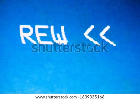 Rewind sign on the screen. Pixelated image. Glitch on the screen. Royalty-Free Stock Photo #1639335166
