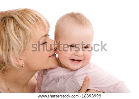 Mother kiss her baby girl and dreaming