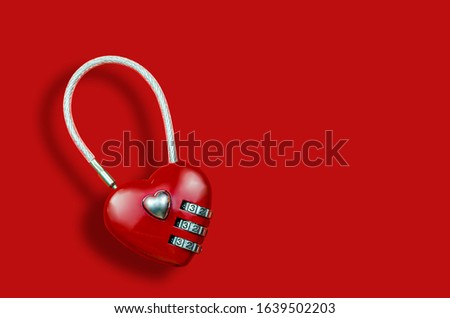 red code lock in the form of a heart. Concept love. heart on lock, key, password from the heart