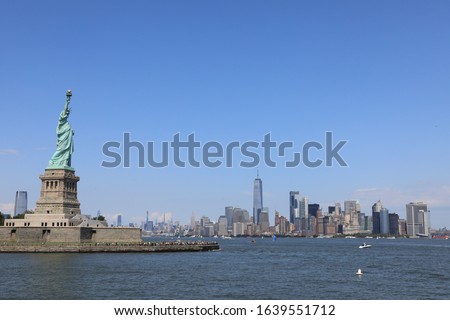 statue of liberty day view from water side 