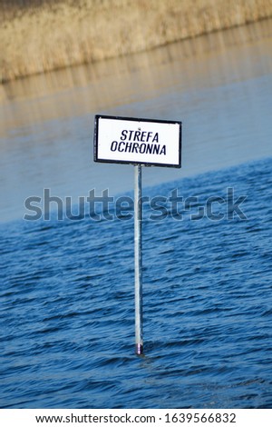Chorzow Silesia Poland."protection zone" sign on the lake.