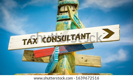Street Sign the Direction Way to TAX CONSULTANT