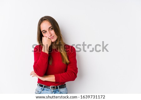 Young caucasian woman posing isolated  who feels sad and pensive, looking at copy space.
