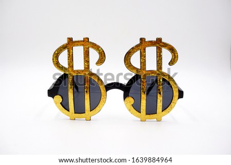 Costume prop - dollar sign sunglasses Royalty-Free Stock Photo #1639884964
