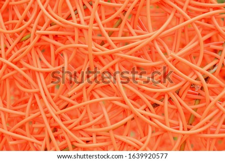 The Random pattern of the Abstract plastic net pattern or lines with orange color
