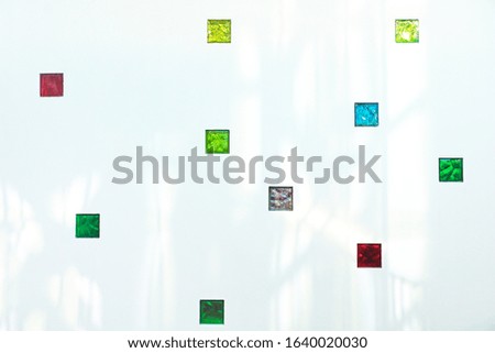 Interior modern building with small colorful glass                            