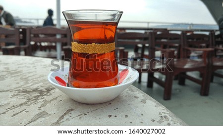 enjoying tea while traveling on the ferry