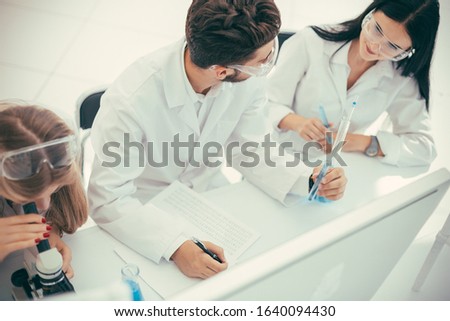 close up. group of doctors testing a vaccine for the koronavirus Royalty-Free Stock Photo #1640094430