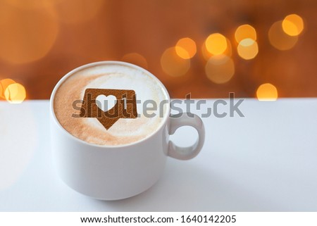 a cup of coffee with a mark social networks like