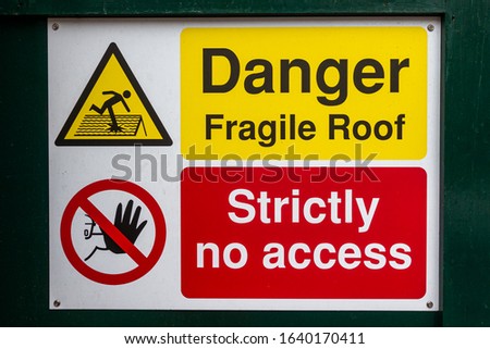 Danger fragile roof strictly no access sign