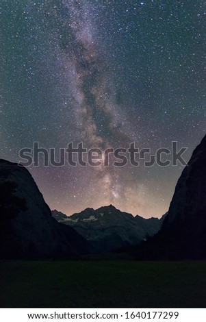 Shot of the Milky Way rising up over the Alps during a summer night at Ahornboden, Austria.
