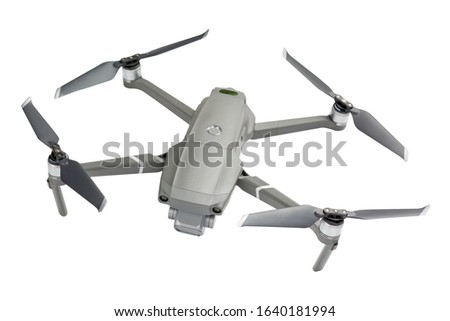 Modern drone quadcopter with a camera isolated on white background
