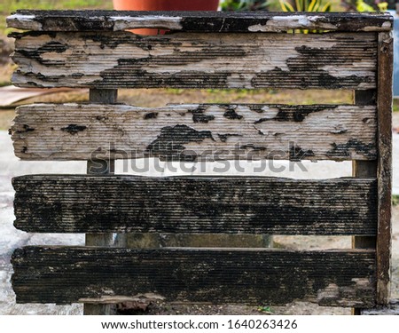 Fragmented wooden signage at Dauis, Bohol, Philippines