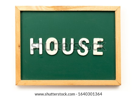 Letter in word house on blackboard in white background
