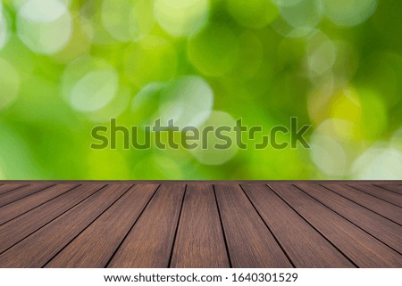 Empty table and garden bokeh background. mock up for display product, Business presentation.