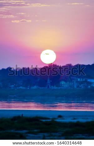 moon over sea, digital photo picture as a background , taken in luang prabang, laos, asia