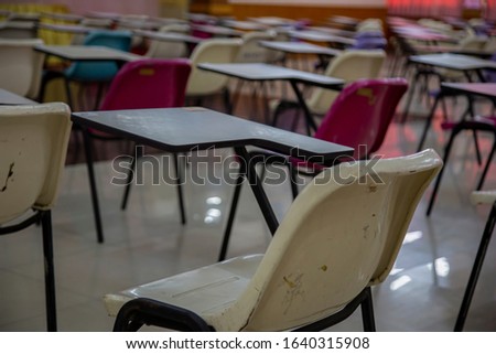 Lecture room or school, empty classroom with tables, steel chairs for study and training in Thailand