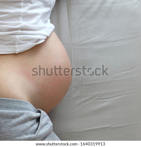 mother pregnant resting on bed, image maternity healthy care concept background