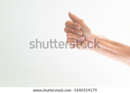 The hands and fingers of the elderly gestures shown on a white background