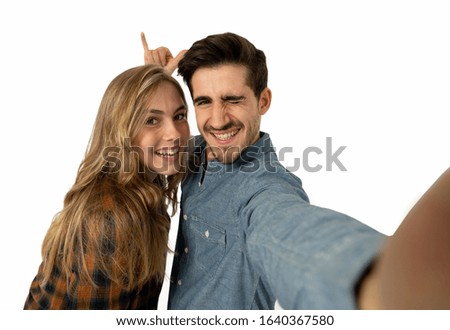 Friends tourist couple in love taking selfies in a romantic vacation. Travel industry and technology advertising style image isolated on white. In Tourism, travel destination and vacation concept.