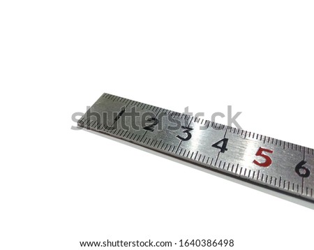 Metal Ruler on White Background
