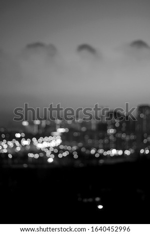 Abstract Bokeh City View at Sunset.  Cityscape Backdrop with Lights. Romantic City Concept.