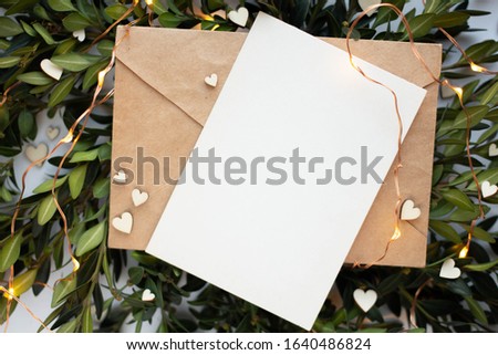 mockup card with plants. invitation card with envelope and details Mockup with postcard on white background. hearts