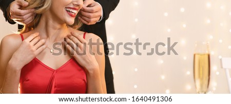 Unrecognizable Woman Getting Golden Necklace From Her Boyfriend For Valentine's Day During Romantic Dinner In Restaurant, Panorama With Free Space Royalty-Free Stock Photo #1640491306