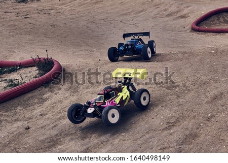 Radio control championship car buggies buggy tt circuit scale 1/8 competition cars rc  Royalty-Free Stock Photo #1640498149