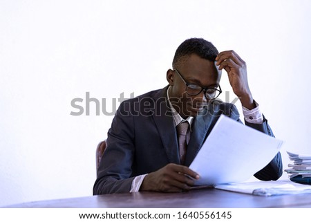 Authentic young guy studying chef working in the office