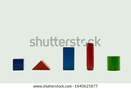 geometric shapes of different colors on a white background
