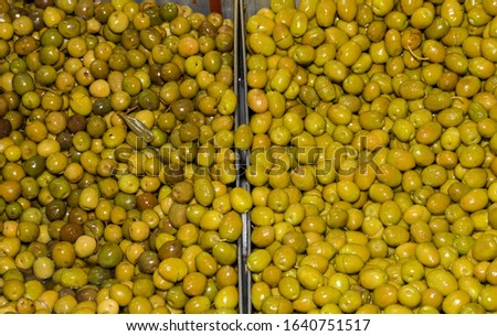 Green olives for sale in bazaar Turkish market, istanbul