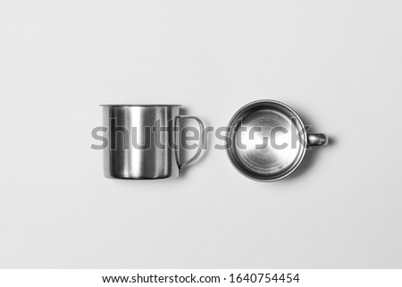 Steel Mugs Mock up isolated on white background.Top view.Metal Cup.High resolution photo.