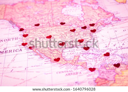 Romantic view of hearts dotting the major cities of North and Central America on an old map Royalty-Free Stock Photo #1640796028