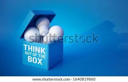 Think out of the box concepts with lightbulb. in box.creativity ideas and work