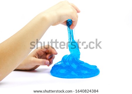 Blue slime for kids, transparent funny toy. Isolated on white background
