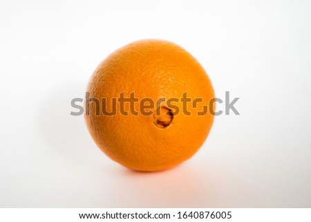 
Orange Washington with a belly button on a white background