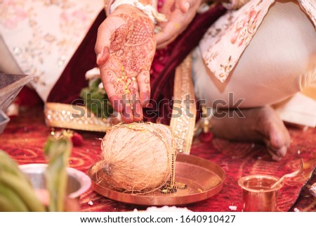 Close-up abstract of Indian Hindu couple performing wedding rituals