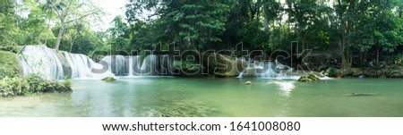 Chet Sao Noi Waterfall in tropical rainforest with rock and turquoise blue pond has 7 tiers, Seven leveled falls are one of most beautiful waterfalls in Thailand.  Namtok chet saonoi National Park