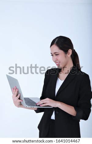 Business women influencer smile success with laptop isolated background 