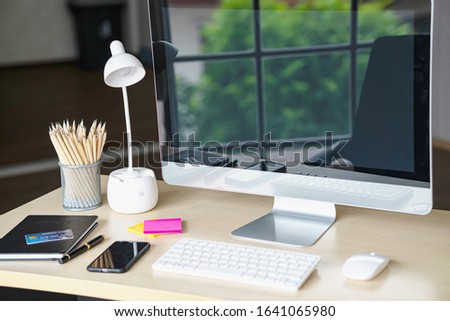 Modern work table with computer. Business finance concepts ideas. 