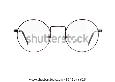 The front view of eyeglasses in a round metal frame isolated on white background.