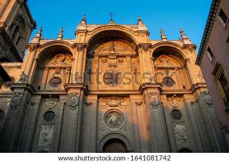 Sunset view of the ain facade of the Granada Cathedral, or Cathedral of the Incarnation Royalty-Free Stock Photo #1641081742