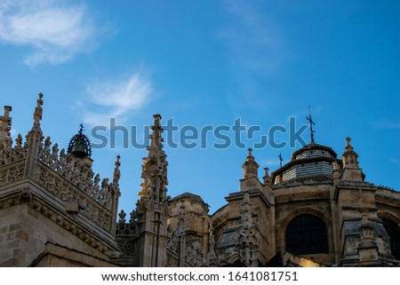 Foreshortening of the Granada Cathedral, or the Cathedral of the Incarnation, a Roman Catholic church in Granada, Spain, in a sunny day. Royalty-Free Stock Photo #1641081751
