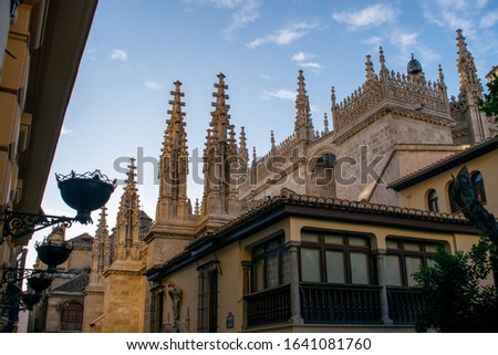 Foreshortening of the Granada Cathedral, or the Cathedral of the Incarnation, a Roman Catholic church in Granada, Spain, in a sunny day Royalty-Free Stock Photo #1641081760